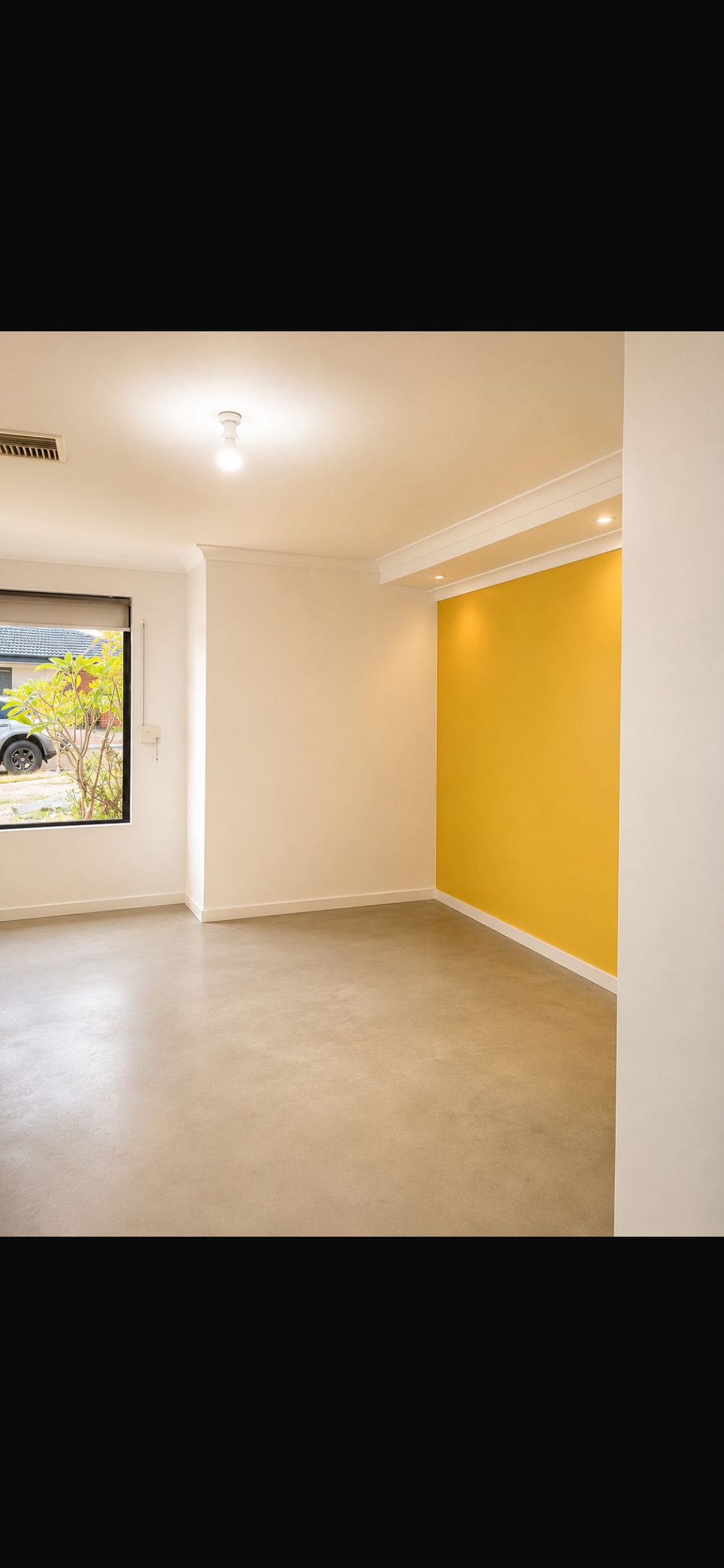 Interior painting with yellow feature wall — Jani Renovations Perth